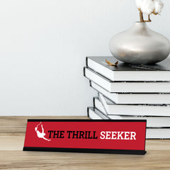 The Thrill Seeker, Black Frame Desk Sign (2x8)