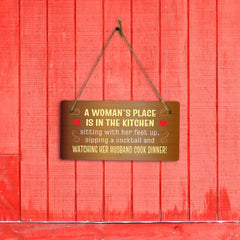A Woman's Place Is In The Kitchen Sitting With Her Feet Up, Sipping A Cocktail And Watching Her Husband Cook Dinner! & Fun 5x10 Hanging Plus Wall or Door Sign