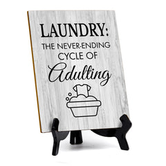 Signs ByLITA Laundry: The never-ending cycle of adulting Table Sign with Acrylic Stand (6x8“)
