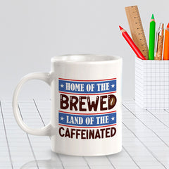 Home Of The Brewed, Land Of The Caffeinated 11oz Plastic or Ceramic Coffee Mug | Funny Patriotic Novelty Office Mug