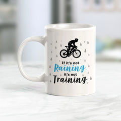 If It’s Not Raining, It’s Not Training, Cyclist Coffee Mug
