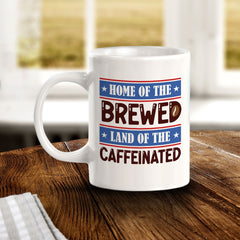 Home Of The Brewed, Land Of The Caffeinated 11oz Plastic or Ceramic Coffee Mug | Funny Patriotic Novelty Office Mug