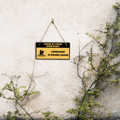 Swim At Your Own Risk! Lifeguard Is Drunk Again 5" x 10" Hanging Wall or Door Sign | Safety Signs