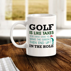 Signs ByLITA Golf Is Like Taxes; You Drive Hard To Make The Green Then End Up In The Hole 11oz Plastic/Ceramic Coffee Mug