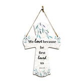 We love because he first loved us. John 4:19 11.5" x 8" Cross Hanging Sign | Rustic Twine | Inspiring Religious Bible Decor