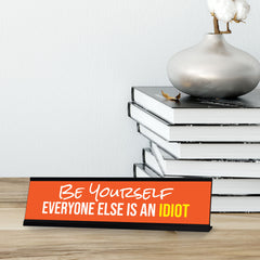 Be Yourself Everyone Else Is An Idiot, Orange Black Frame, Desk Sign (2x8“)