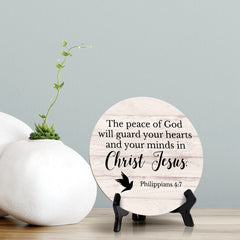 Round The Peace Of God Will Guard Your Hearts And Your Minds In Christ Jesus. Philippians 4:7 Wood Color Circle Table Sign (5x5")
