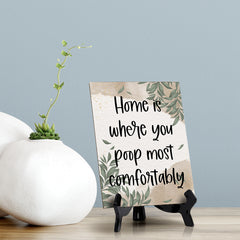 Home Is Where You Poop Most Comfortably Table Sign with Green Leaves Design (6 x 8")