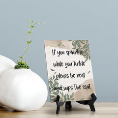 If You Sprinkle While You Tinkle Please Be Neat And Wipe The Seat Table Sign with Green Leaves Design (6 x 8")