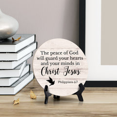 Round The Peace Of God Will Guard Your Hearts And Your Minds In Christ Jesus. Philippians 4:7 Wood Color Circle Table Sign (5x5")