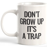 Don't Grow Up It's a Trap Coffee Mug