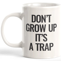 Don't Grow Up It's a Trap Coffee Mug
