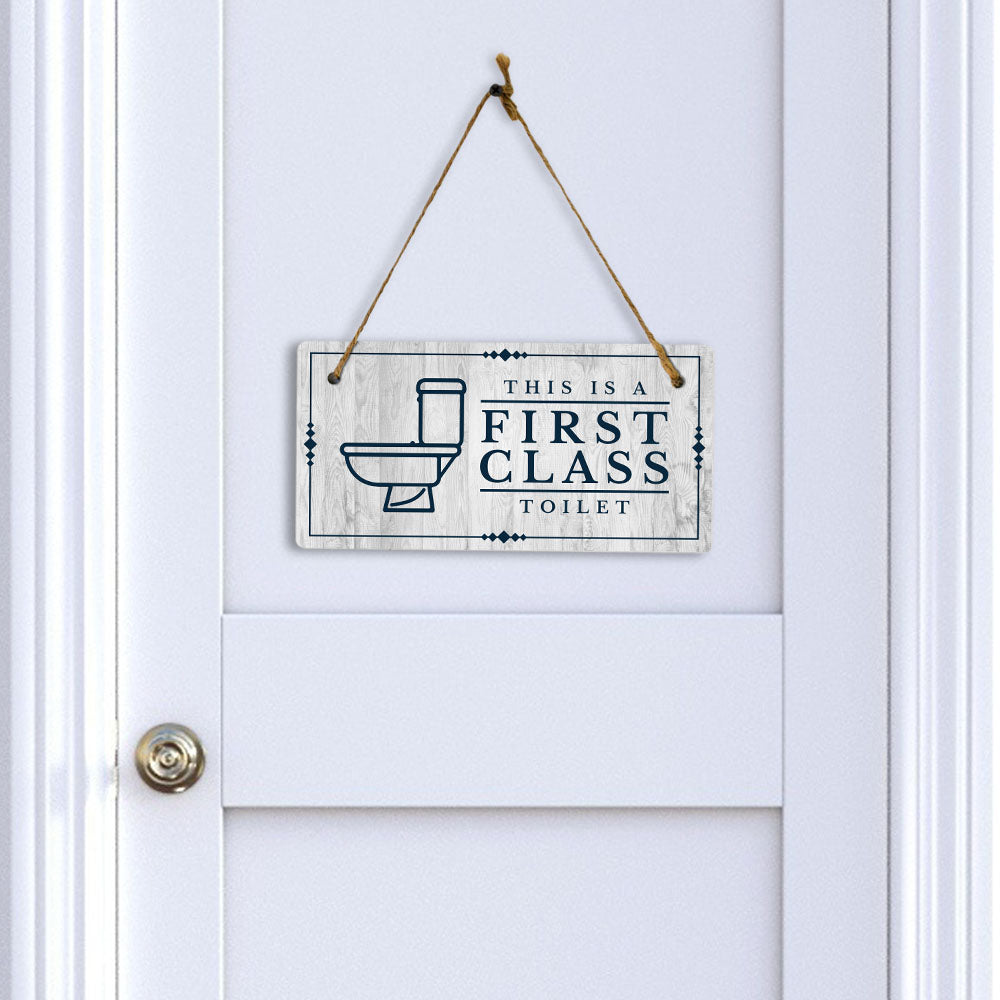 This is a First-Class Toilet 5x10 Hanging Wall or Door Sign | Warm Welcoming Signage For Homes