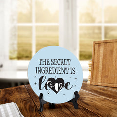 The Secret Ingredient Is Love Circle Table Sign with Acrylic Stand (5x5") | Funny Home Decor