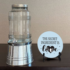 The Secret Ingredient Is Love Circle Table Sign with Acrylic Stand (5x5") | Funny Home Decor