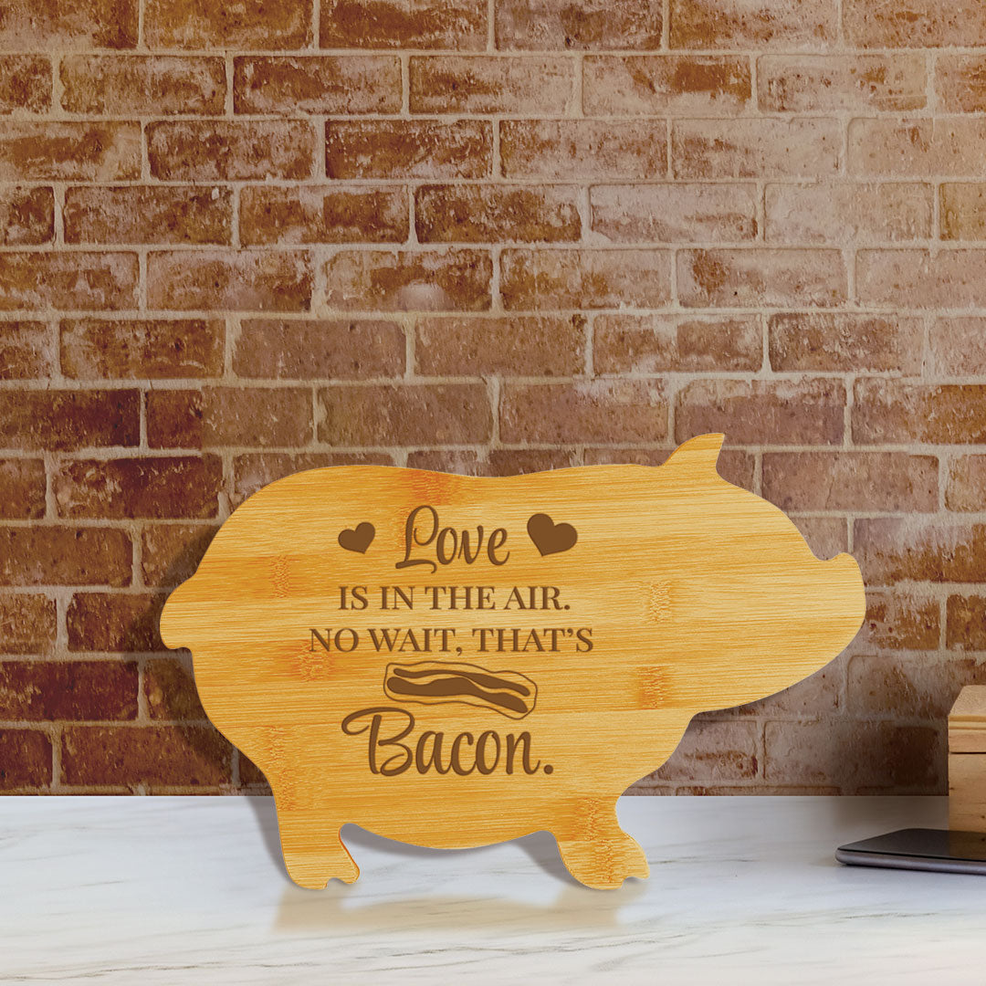 Love is in the air. No wait, that’s bacon. (13.75 x 8.75") Pig Shape Cutting Board | Funny Decorative Kitchen Chopping Board