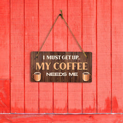I Must Get Up... My Coffee Needs Me Wood 5" x 10" Hanging Wall or Door Sign | Funny Home Decor