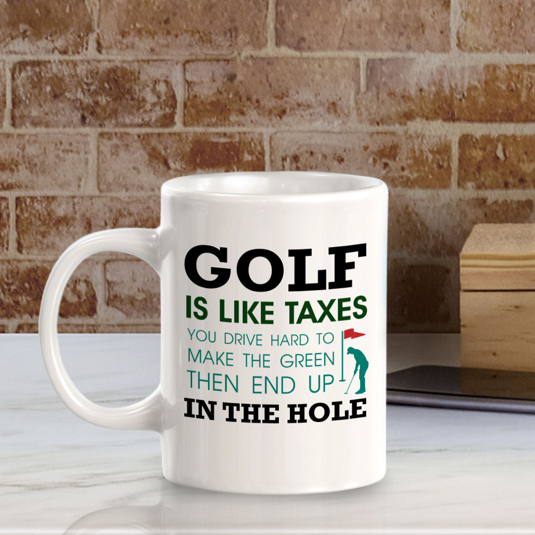 Signs ByLITA Golf Is Like Taxes; You Drive Hard To Make The Green Then End Up In The Hole 11oz Plastic/Ceramic Coffee Mug