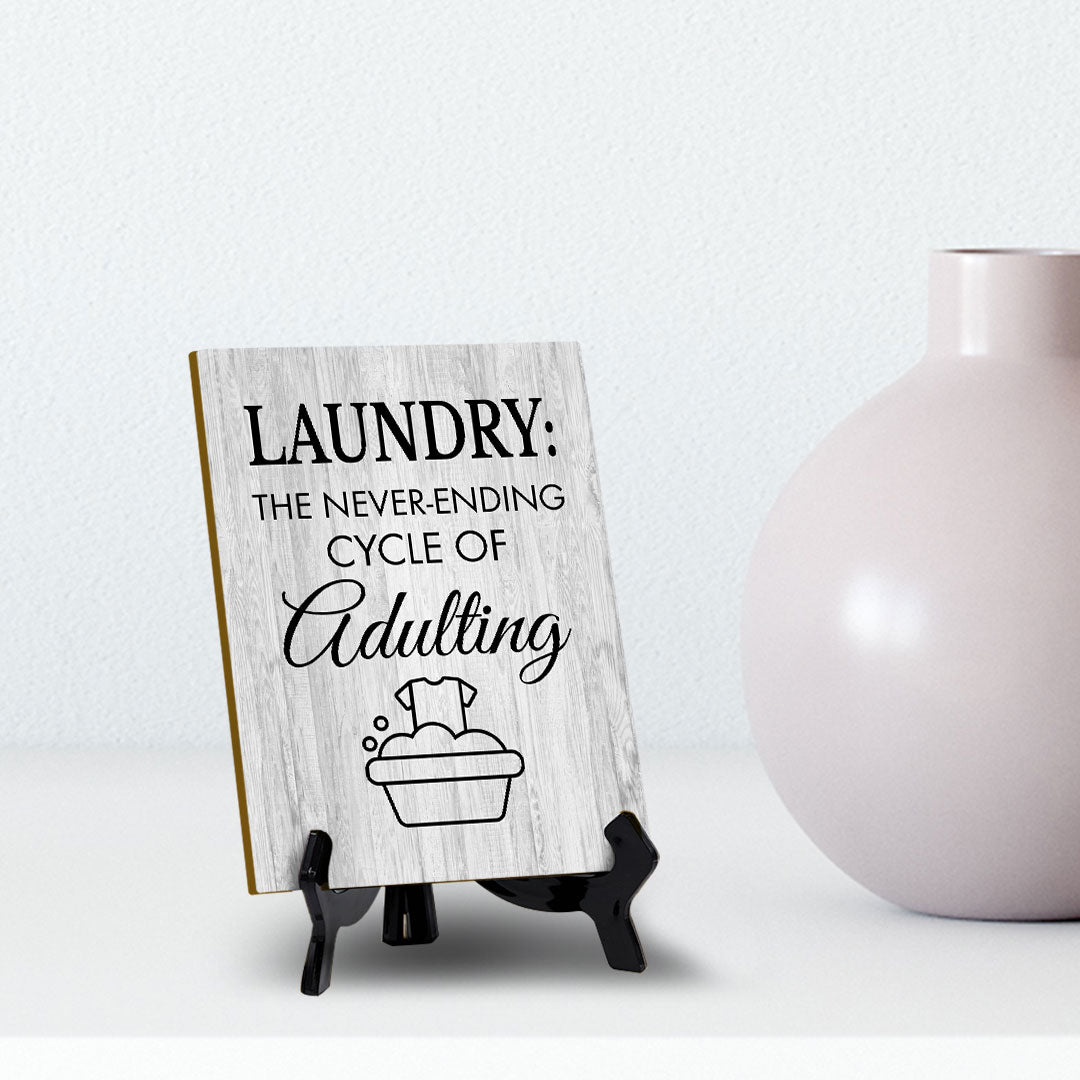 Signs ByLITA Laundry: The never-ending cycle of adulting Table Sign with Acrylic Stand (6x8“)