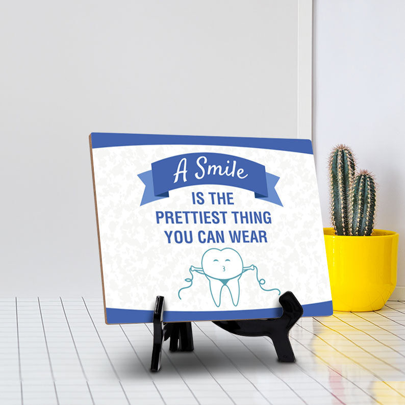 Signs ByLITA A Smile Is The Prettiest Thing you Can Wear Dental Office Decor, Table Sign with Acrylic Stand (6x8“)