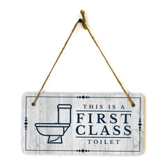 This is a First-Class Toilet 5x10 Hanging Wall or Door Sign | Warm Welcoming Signage For Homes
