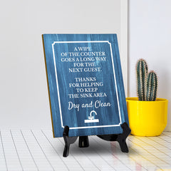 Signs ByLITA A Wipe of the Counter Goes a Long Way for the Next Guest. Thanks for Helping to Keep the Sink Area Dry and Clean Restroom Table Sign with Acrylic Stand (6x8“)