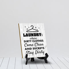Signs ByLITA Laundry: Where dirty clothes come clean and secrets stay dirty Table Sign with Acrylic Stand (6x8“)