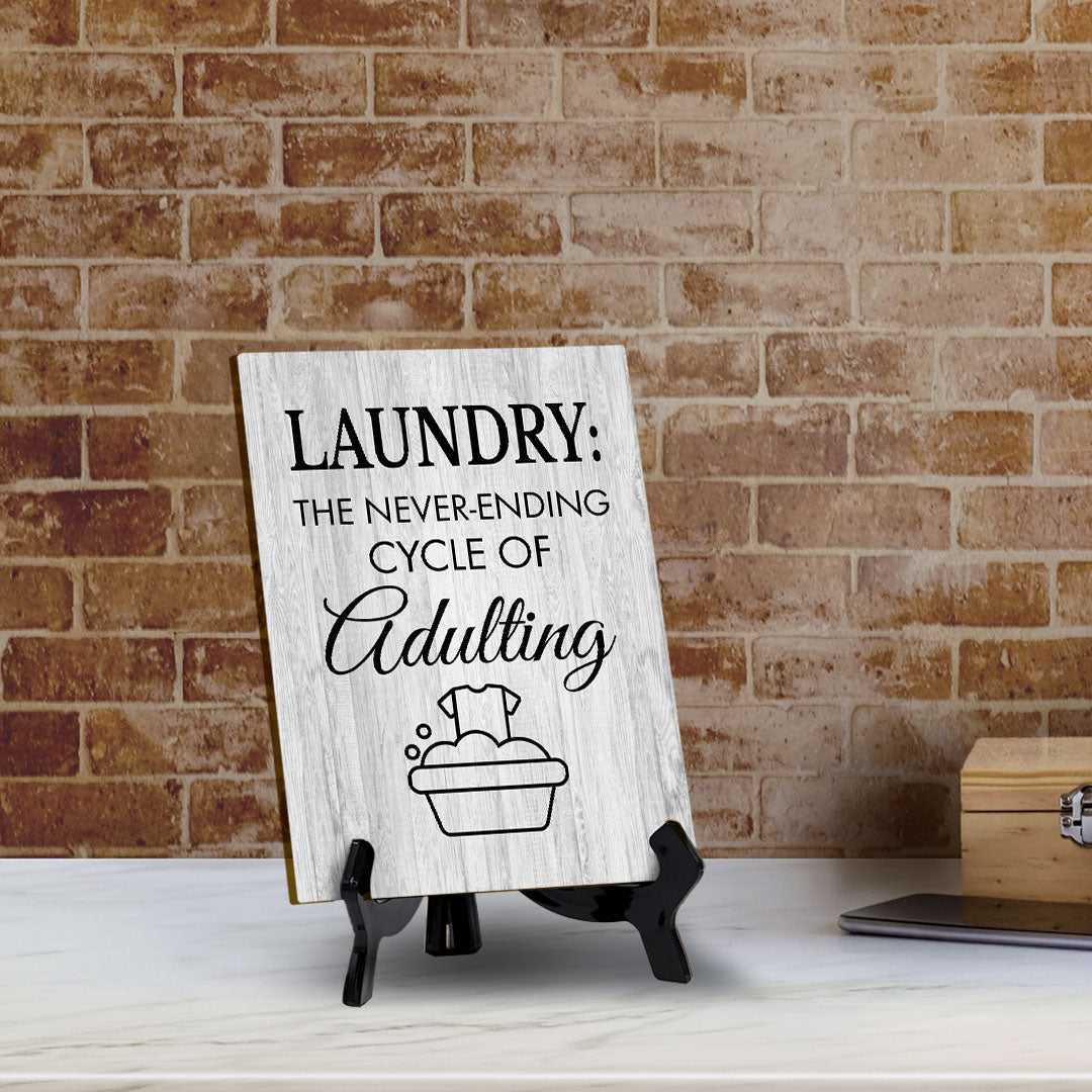 Signs ByLITA Laundry: The never-ending cycle of adulting Table Sign with Acrylic Stand (6x8“)