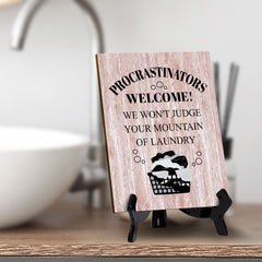 Signs ByLITA Procrastinators welcome! We won't judge your mountain of laundry Table Sign with Acrylic Stand (6x8“)