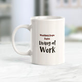 Working from home (crossed out). Living at Work Coffee Mug