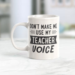 Don't make me use my teacher voice Coffee Mug