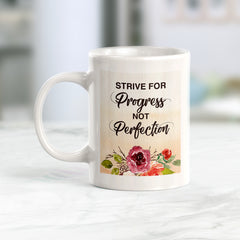 Strive for progress not perfection Watercolor Coffee Mug
