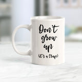 Don't Grow Up It's A Trap Coffee Mug