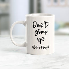 Don't Grow Up It's A Trap Coffee Mug