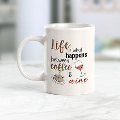 Life is what happens between Coffee and Wine Coffee Mug