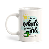 In A While Crocodile Coffee Mug