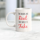 The Boobs Are Real The Smile Is Fake Coffee Mug